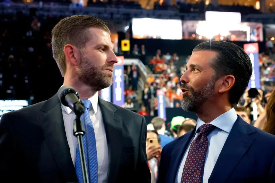 Don Jr. and Eric Trump discussing Bitcoin predictions at a public event, forecasting a potential $170K BTC surge