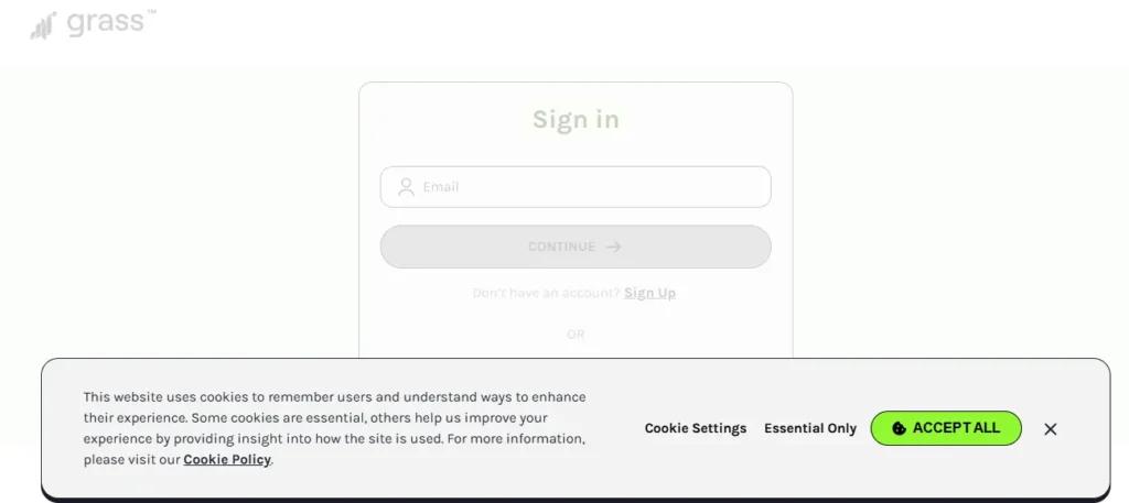 Grass website sign-in page with email field, sign-up option, and cookie consent message.