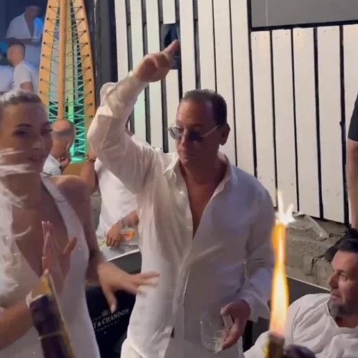 Josip Heit celebrating at a party in white outfit with GSPartners members