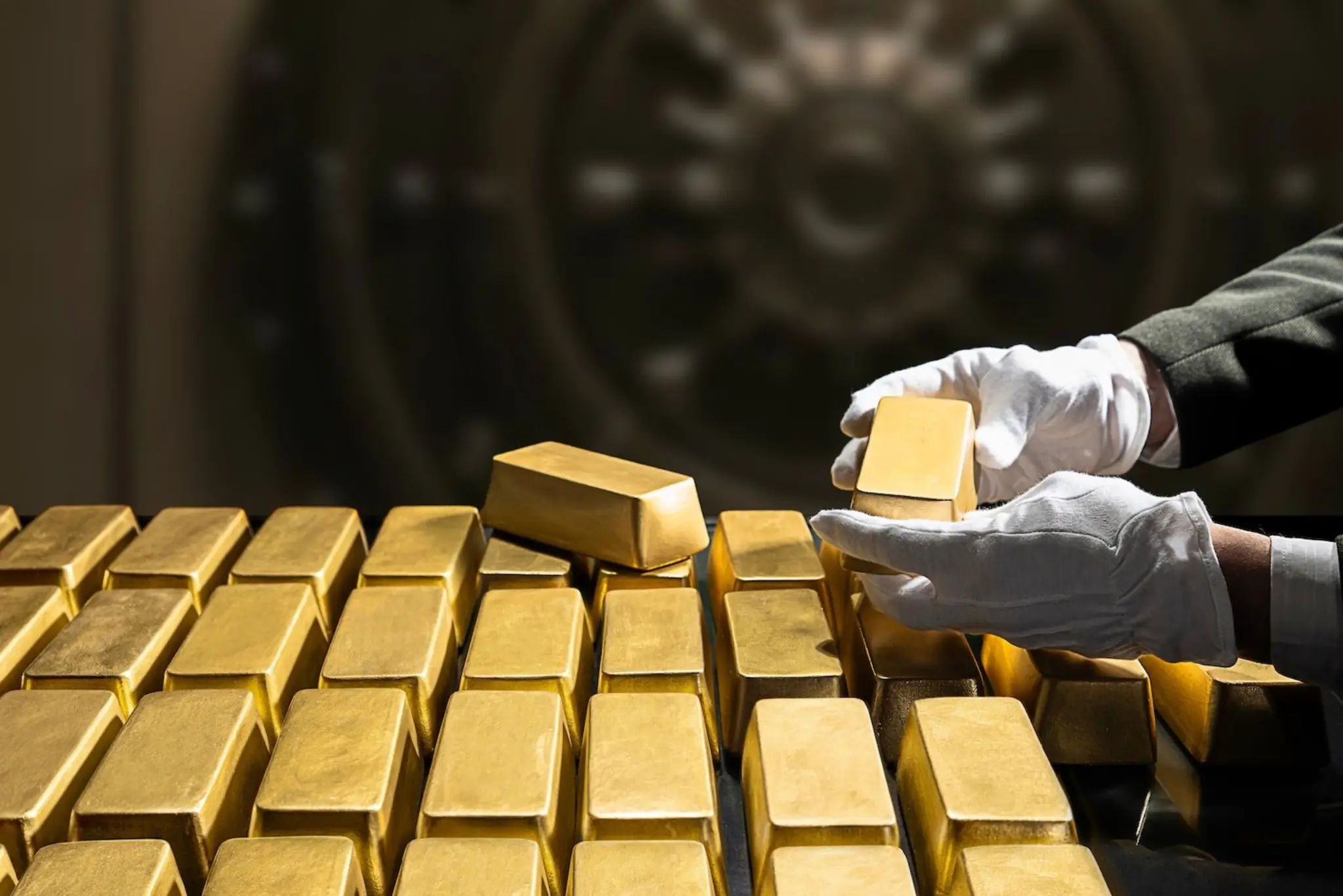 Binance Gold and Silver perpetual futures trading image showing gold bars representing USDT-settled commodity contracts