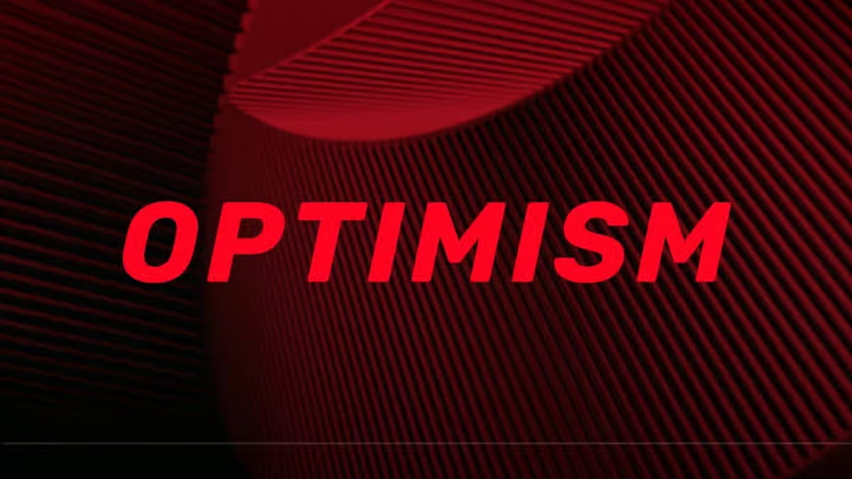 Optimism motivational concept with bold red typography on abstract modern background