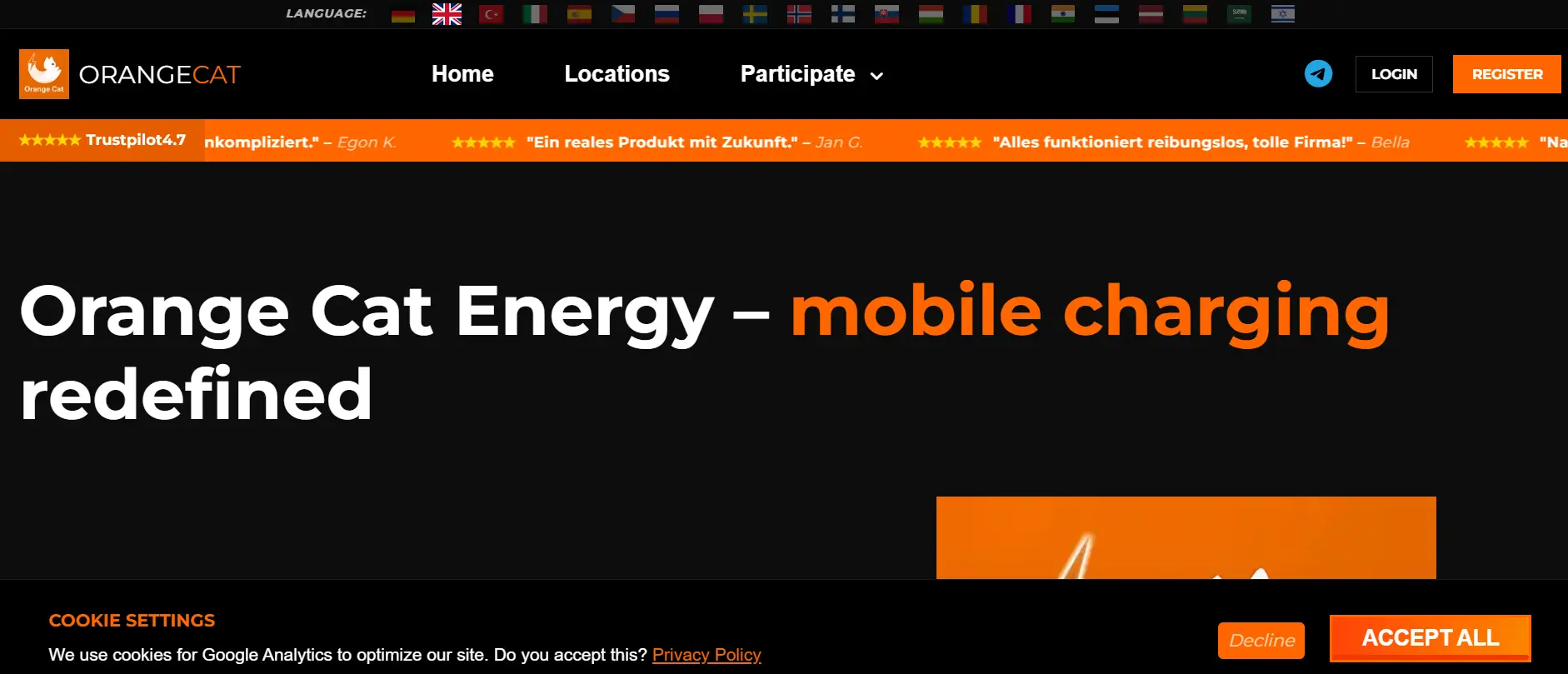 Orange Cat Energy homepage showing mobile charging services and website interface