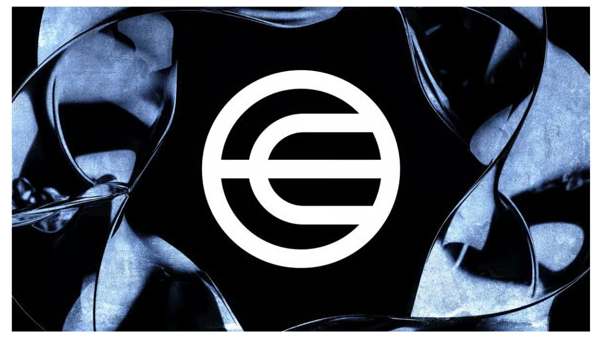 Worldcoin logo on a dark blue artistic background, illustrating the 43% reduction in the WLD token unlock rate to support market stability.