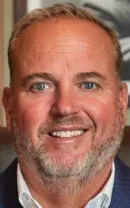 Portrait of Forever Living executive related to MLM shutdown in the USA after FTC action