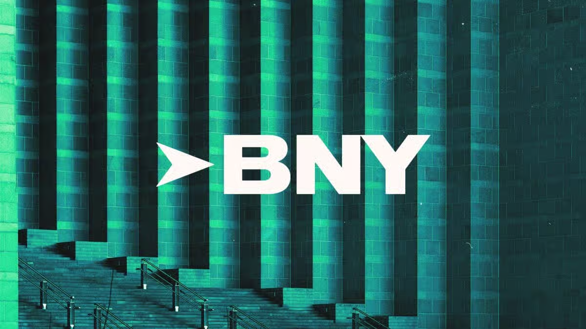 BNY logo displayed on a modern teal-colored building background representing financial services and corporate banking environment