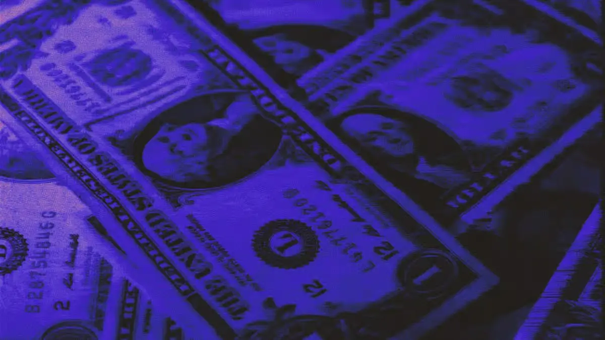 US dollar bills representing the decline in crypto VC deal count as venture capital investors become more selective.