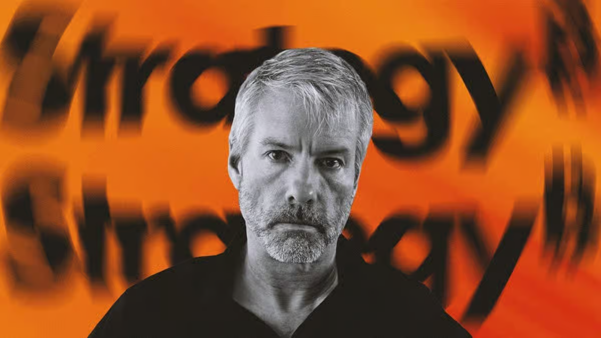 Michael Saylor with the MicroStrategy logo in the background representing the company's Bitcoin investment strategy.