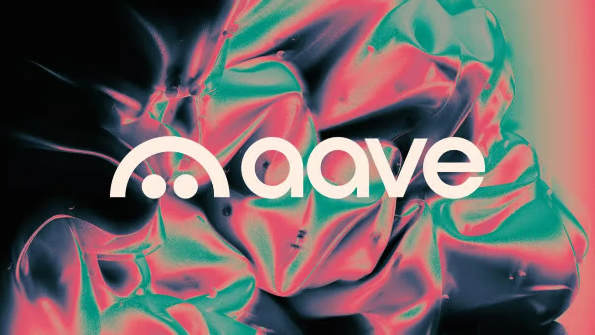 White Aave logo displayed over a colorful metallic textured background with pink, teal, and dark glossy folds.