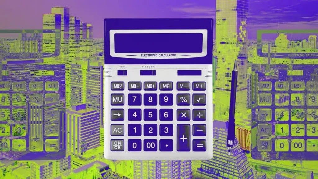 An electronic desktop calculator and pen placed over a stylized green and purple city skyline background, representing finance and business calculations