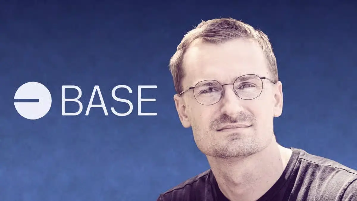 Portrait of Jesse Pollak wearing glasses beside the Base logo against a dark blue background